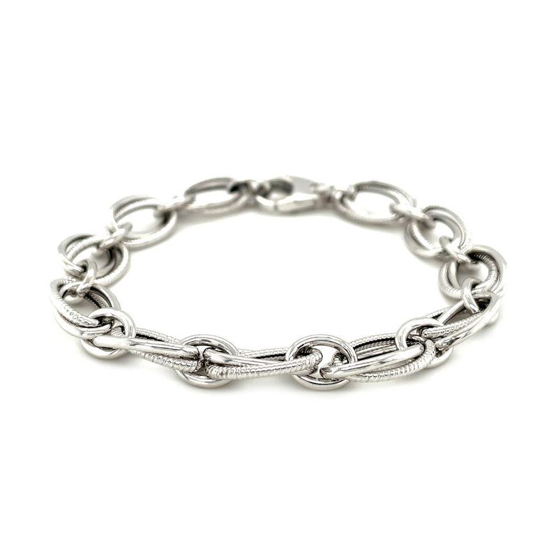 Polished and Textured Oval Link Bracelet in Sterling Silver