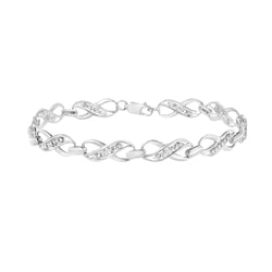 .925 Sterling Silver Prong Set Diamond Accent Ribbon and Infinity Link Bracelet (I-J Color, I3 Clarity) - 7.25"