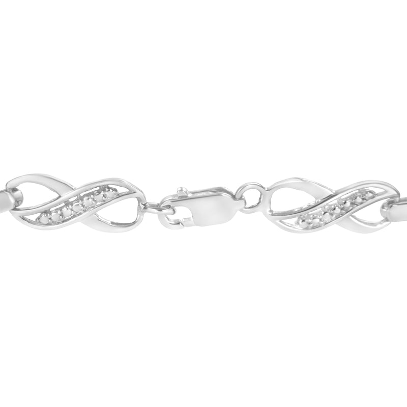 .925 Sterling Silver Prong Set Diamond Accent Ribbon and Infinity Link Bracelet (I-J Color, I3 Clarity) - 7.25"