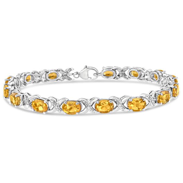 .925 Sterling Silver 7x5 mm Oval Cut Orange Citrine and 1/20 cttw Round Cut Diamond Fashion Tennis Bracelet (I-J Color, I1-I2 Clarity) - 7"