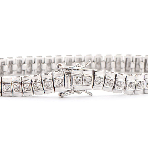 0.58 TW CTS DIAMONDS RHODIUM PLATED DESIGNER BRACELET SIZE 7.75 INCHES