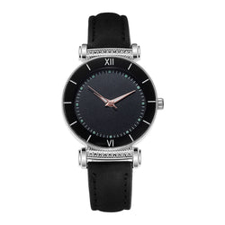 Stainless steel quartz watch with leather strap for women.