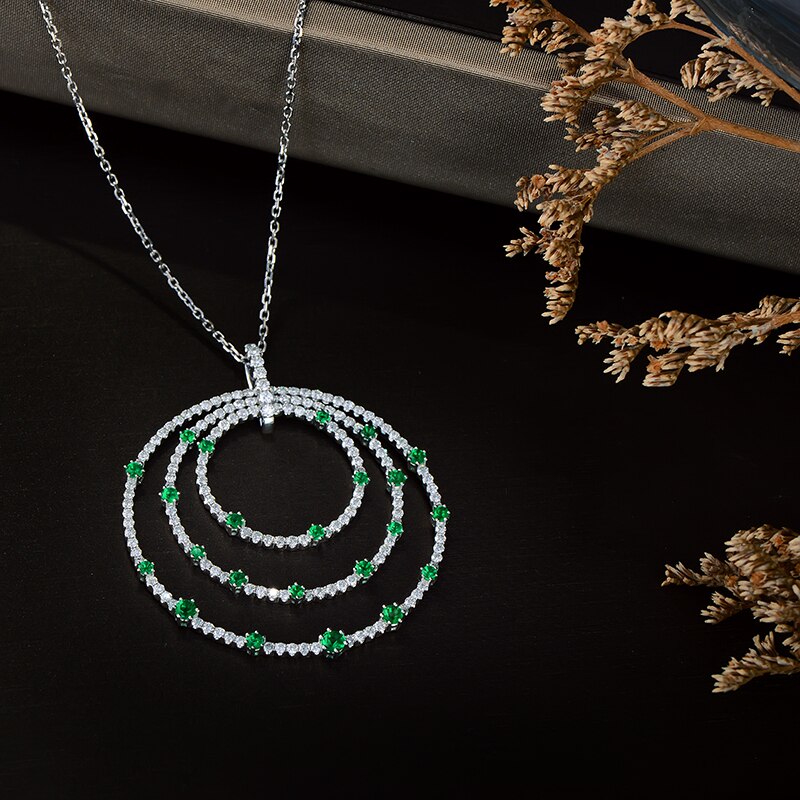 14k White Gold Circle Pendant with 0.50ctw Diamond and Emerald - for Women