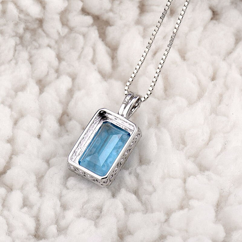 14Kt White Gold Blue Topaz Pendant Necklace for Women