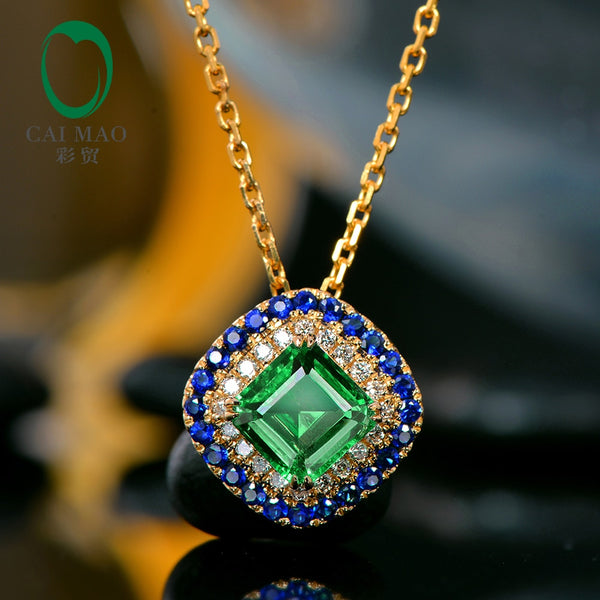 14kt Yellow Gold Emerald Pendant with Diamonds and Sapphire Accents for Women