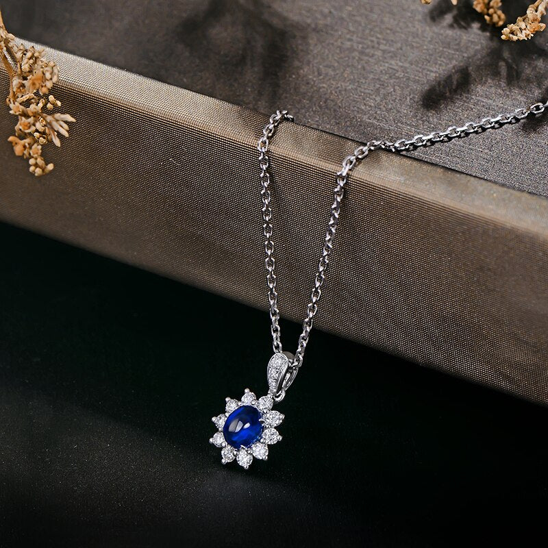 14kt White Gold Blue Sapphire Halo Pendant for Women