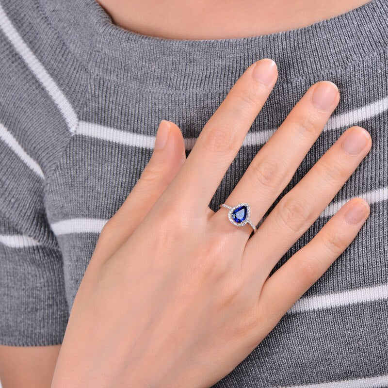 14k Gold Blue Tanzanite Engagement Ring Please tell me what pronoun you'd like me to use for "gender." ??