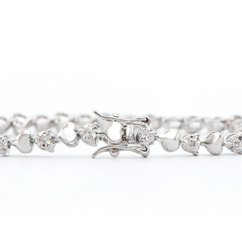 0.16 TW CTS DIAMONDS RHODIUM PLATED DESIGNER BRACELET 7.9 INCHES