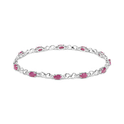 .925 Sterling Silver Pink Oval Shaped Ruby and 1/4 Cttw Diamond 7.25" Link Bracelet (I-J Color, I2-I3 Clarity)